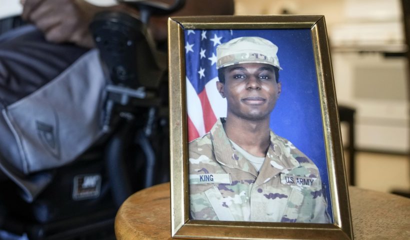 A portrait of American soldier Travis King is displayed as his grandfather, Carl Gates, talks about his grandson on July 19, 2023, in Kenosha, Wis. North Korea asserted Wednesday, Aug. 15, 2023, that Gates, a U.S. soldier who bolted into the North across the heavily armed Korean border last month, did so after being disillusioned with the inequality of American society and racial discrimination in its Army. (AP Photo/Morry Gash, File)