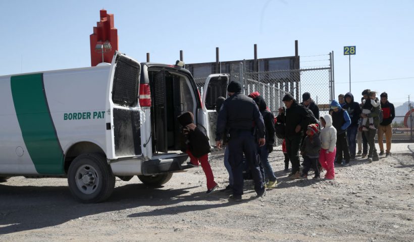 EL PASO, - MARCH 31: A U.S. Border Patrol agent loads detained migrants into a van at the border of the United States and Mexico on March 31, 2019 in El Paso, Texas. U.S. President Donald Trump has threatened to close the United States border if Mexico does not stem the flow of illegal migrants trying to cross. (Photo by Justin Sullivan/Getty Images)