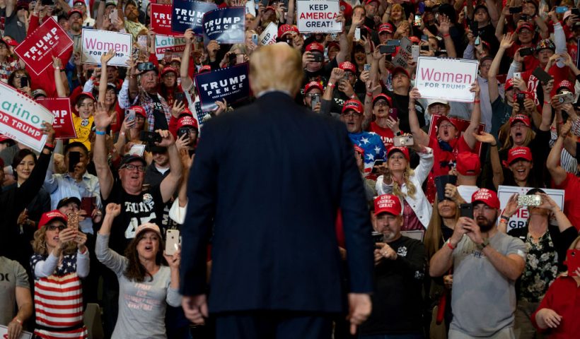 TOPSHOT - Supporters cheer as US President Donald Trump arrives to deliver remarks at a Keep America Great rally in Las Vegas, Nevada, on February 21, 2020. (Photo by JIM WATSON / AFP) (Photo by JIM WATSON/AFP via Getty Images)