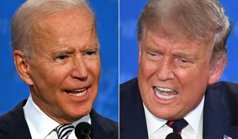 TOPSHOT - (COMBO) This combination of pictures created on September 29, 2020 shows Democratic Presidential candidate and former US Vice President Joe Biden (L) and US President Donald Trump speaking during the first presidential debate at the Case Western Reserve University and Cleveland Clinic in Cleveland, Ohio on September 29, 2020. (Photos by JIM WATSON and SAUL LOEB / AFP) (Photo by JIM WATSON,SAUL LOEB/AFP via Getty Images)