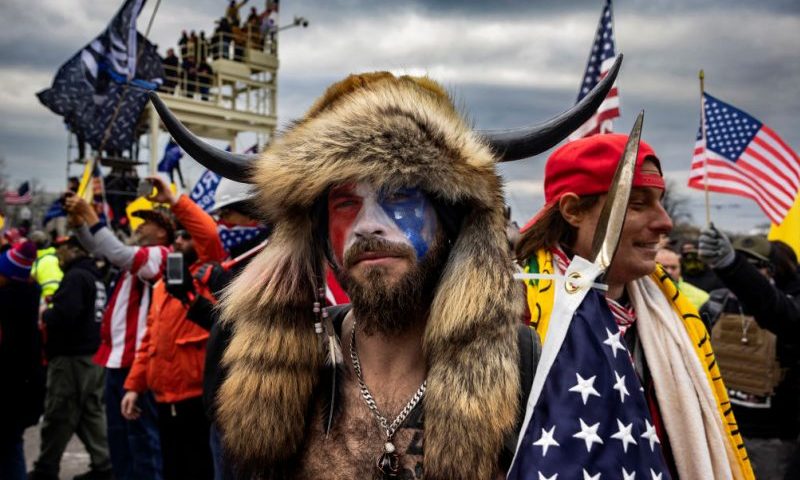 WASHINGTON, DC - JANUARY 6: Jacob Anthony Angeli Chansley, known as the QAnon Shaman, is seen at the Capital riots. On January 9, Chansley was arrested on federal charges of "knowingly entering or remaining in any restricted building or grounds without lawful authority, and with violent entry and disorderly conduct on Capitol grounds"Trump supporters clashed with police and security forces as people try to storm the US Capitol on January 6, 2021 in Washington, DC. Demonstrators breeched security and entered the Capitol as Congress debated the 2020 presidential election Electoral Vote Certification. (photo by Brent Stirton/Getty Images)