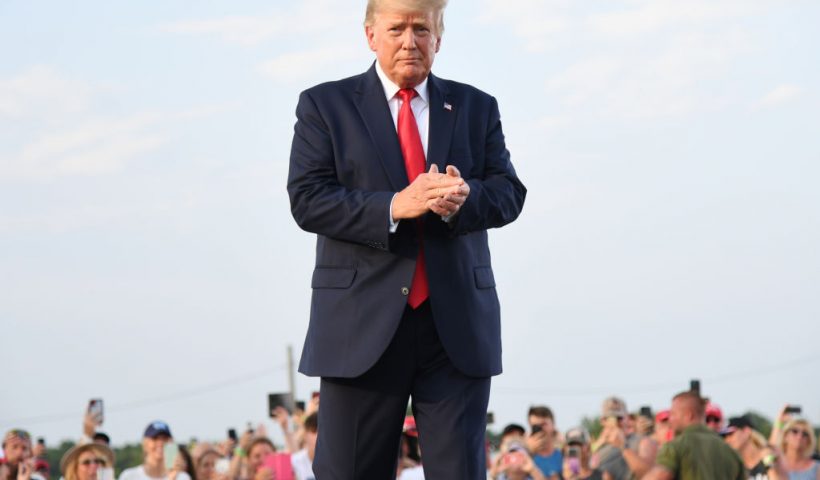 MENDON, IL - JUNE 25: Donald Trump arrives to give remarks during a Save America Rally with former US President Donald Trump at the Adams County Fairgrounds on June 25, 2022 in Mendon, Illinois. Trump will be stumping for Rep. Mary Miller in an Illinois congressional primary and it will be Trump's first rally since the United States Supreme Court struck down Roe v. Wade on Friday. (Photo by Michael B. Thomas/Getty Images)