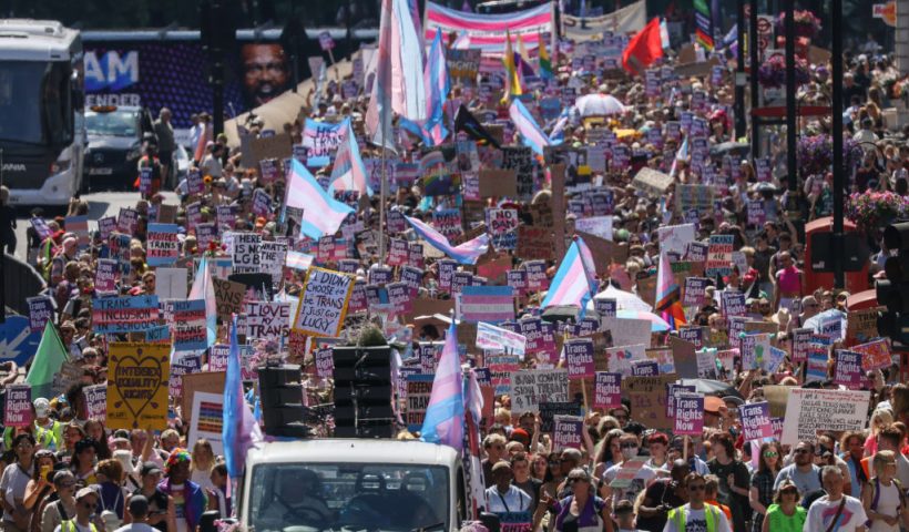 LONDON, ENGLAND - JULY 09: Demonstrators hold banners and placards during the London Trans Pride protest on July 9, 2022 in London, England. Trans rights activists took to the streets of central London this weekend to march for the fourth year under the slogan, Pride is a Protest at Trans+ Pride. (Photo by Hollie Adams/Getty Images)