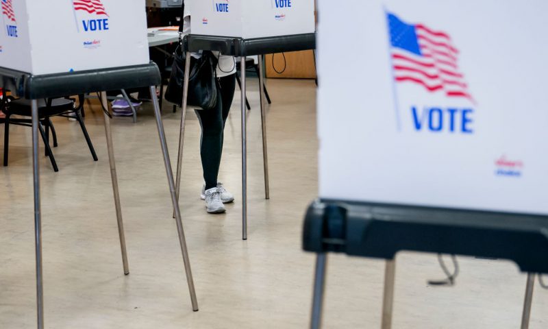 BALTIMORE, MD - JULY 19: A voter casts their ballot at a polling place at The League for People with Disabilities during the midterm primary election on July 19, 2022 in Baltimore, Maryland. Voters will choose candidates during the primary for governor and seats in the House of Representatives in the upcoming November election. (Photo by Nathan Howard/Getty Images)