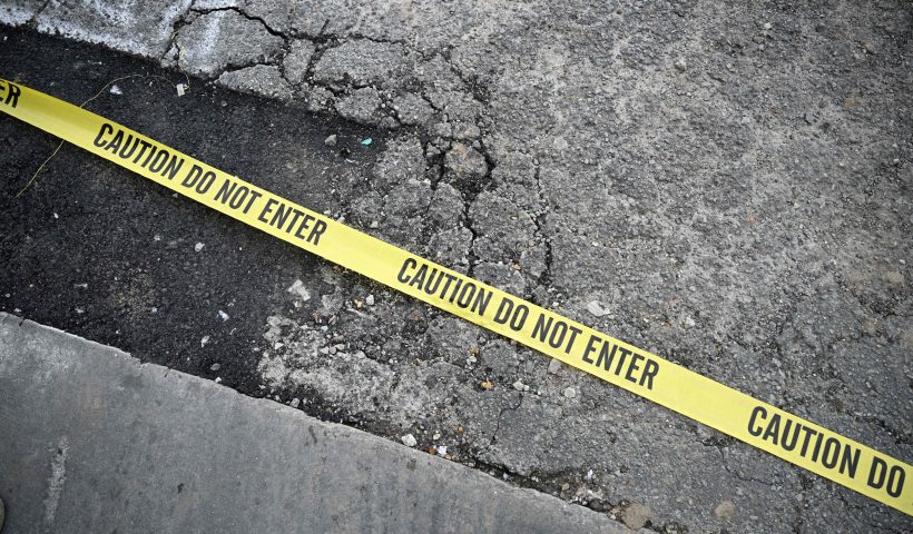 TOPSHOT-US-CRIME-SHOOTING TOPSHOT - Police tape is seen on the ground at the scene of a mass shooting in Monterey Park, California, on January 22, 2023. - Ten people have died and at least 10 others have been wounded in a mass shooting in a largely Asian city in southern California, police said, with the suspect still at large hours later. (Photo by Robyn BECK / AFP) (Photo by ROBYN BECK/AFP via Getty Images)