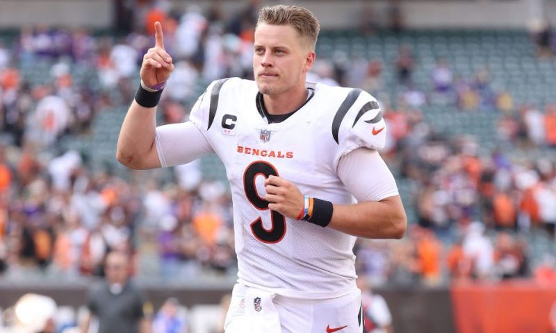 CINCINNATI, OHIO - SEPTEMBER 12: Joe Burrow #9 of the Cincinnati Bengals jogs off the field after beating the Minnesota Vikings 27-24 in overtime of the Cincinnati Bengals against the Minnesota Vikings at Paul Brown Stadium on September 12, 2021 in Cincinnati, Ohio. (Photo by Andy Lyons/Getty Images)