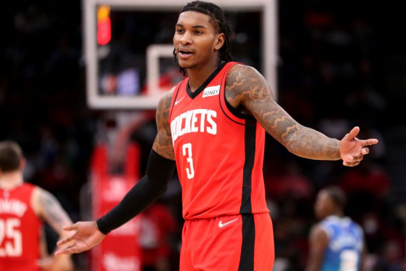 HOUSTON, TEXAS - NOVEMBER 27: Kevin Porter Jr. #3 of the Houston Rockets reacts towards the Rockets bench during the second half against the Charlotte Hornets during the first half at Toyota Center on November 27, 2021 in Houston, Texas. NOTE TO USER: User expressly acknowledges and agrees that, by downloading and or using this photograph, User is consenting to the terms and conditions of the Getty Images License Agreement. (Photo by Carmen Mandato/Getty Images)