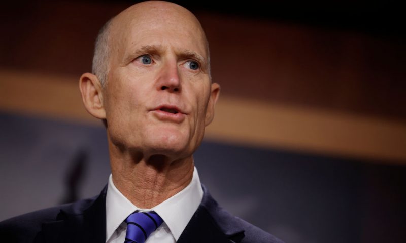 Sen. Sen. Rick Scott (R-FL) talk to reporters about the federal debt limit during a news conference with members of the House Freedom Caucus at the U.S. Capitol on March 22, 2023 in Washington, DC. The conservative Republicans were critical of President Joe Biden's federal budget proposal and repeated their slogan, "shrink Washington and grow America," while demanding that spending cuts go hand-in-hand with raising the debt limit (Photo by Chip Somodevilla/Getty Images)