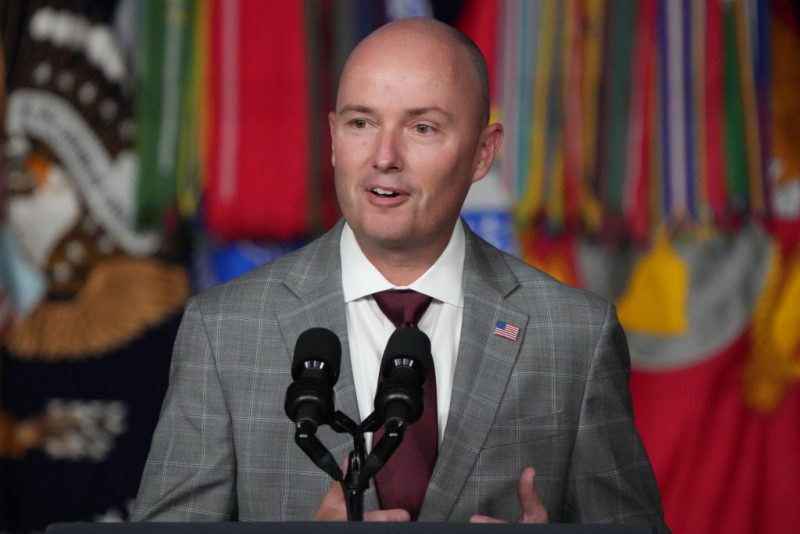 SALT LAKE CITY, UTAH - AUGUST 10: Utah Governor Spencer Cox welcomes U.S. President Joe Biden before he spoke at the George E. Wahlen Department of Veterans Affairs Medical Center on August 10, 2023 in Salt Lake City, Utah. President Biden was celebrating the first anniversary of the PACT Act. (Photo by George Frey/Getty Images)