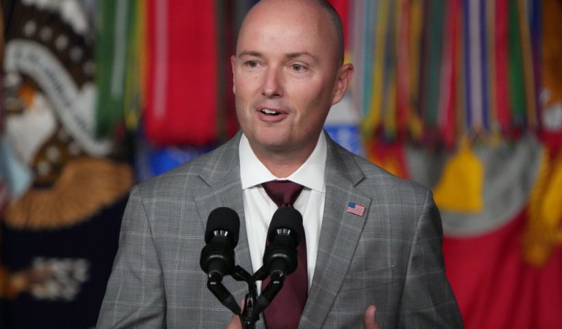 SALT LAKE CITY, UTAH - AUGUST 10: Utah Governor Spencer Cox welcomes U.S. President Joe Biden before he spoke at the George E. Wahlen Department of Veterans Affairs Medical Center on August 10, 2023 in Salt Lake City, Utah. President Biden was celebrating the first anniversary of the PACT Act. (Photo by George Frey/Getty Images)