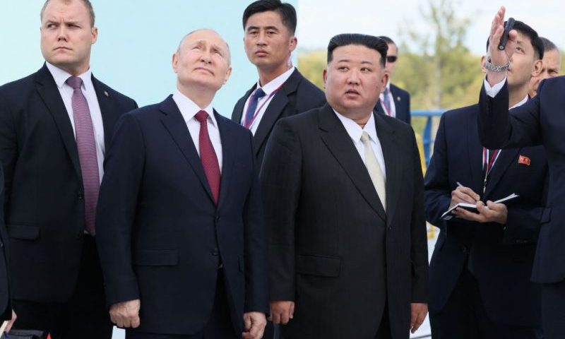 TOPSHOT - In this pool photo distributed by Sputnik agency, Russia's President Vladimir Putin (centre L) and North Korea's leader Kim Jong Un (centre R) visit the Vostochny Cosmodrome in Amur region on September 13, 2023. Russian President Vladimir Putin and North Korean leader Kim Jong Un both arrived at the Vostochny Cosmodrome in Russia's Far East, Russian news agencies reported on September 13, ahead of planned talks that could lead to a weapons deal. (Photo by Mikhail Metzel / POOL / AFP) (Photo by MIKHAIL METZEL/POOL/AFP via Getty Images)