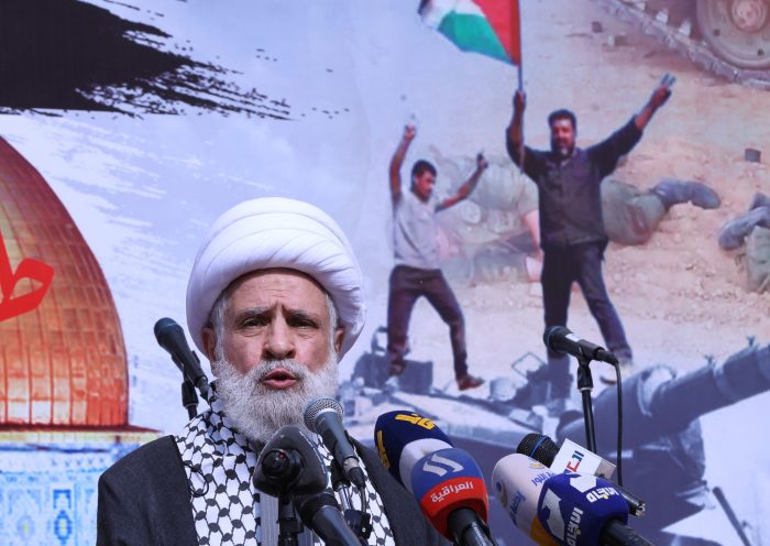 LEBANON-PALESTINIAN-ISRAEL-CONFLICT-DEMO The deputy chief of Lebanon's Shiite militant group Hezbollah, Sheikh Naim Qassem, delivers a speech during a rally in Beirut on October 13, 2023, as thousands of protesters poured onto the streets of several Middle East capitals in support of Palestinians amid Israeli air strikes on Gaza in reprisal for a surprise Hamas attack. Thousands of people, both Israeli and Palestinians have died since October 7, 2023, after Palestinian Hamas militants entered Israel in a surprise attack leading Israel to declare war on Hamas in the Gaza Strip on October 8. (Photo by ANWAR AMRO / AFP) (Photo by ANWAR AMRO/AFP via Getty Images)