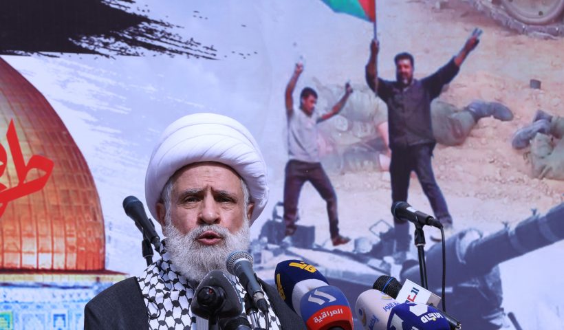 LEBANON-PALESTINIAN-ISRAEL-CONFLICT-DEMO The deputy chief of Lebanon's Shiite militant group Hezbollah, Sheikh Naim Qassem, delivers a speech during a rally in Beirut on October 13, 2023, as thousands of protesters poured onto the streets of several Middle East capitals in support of Palestinians amid Israeli air strikes on Gaza in reprisal for a surprise Hamas attack. Thousands of people, both Israeli and Palestinians have died since October 7, 2023, after Palestinian Hamas militants entered Israel in a surprise attack leading Israel to declare war on Hamas in the Gaza Strip on October 8. (Photo by ANWAR AMRO / AFP) (Photo by ANWAR AMRO/AFP via Getty Images)