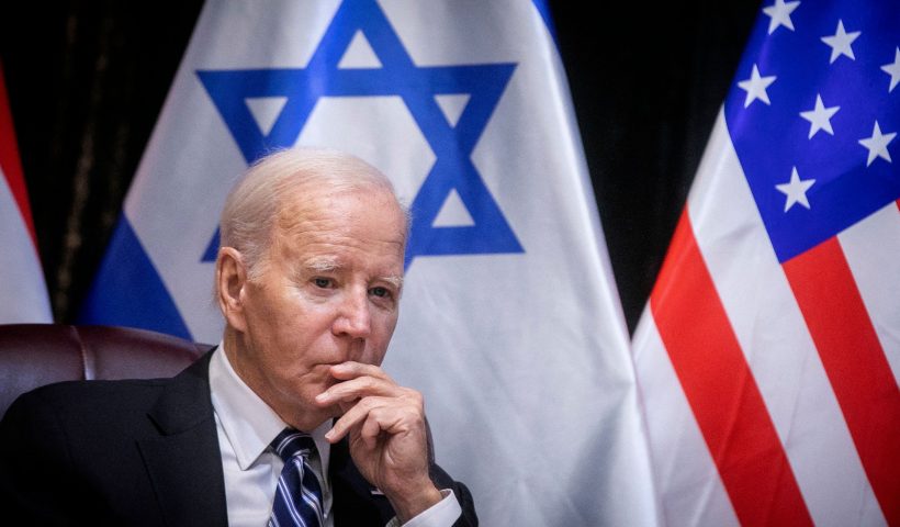 TOPSHOT - US President Joe Biden joins Israel's Prime Minister for the start of the Israeli war cabinet meeting, in Tel Aviv on October 18, 2023, amid the ongoing battles between Israel and the Palestinian group Hamas. US President Joe Biden landed in Tel Aviv on October 18, 2023 as Middle East anger flared after hundreds were killed when a rocket struck a hospital in war-torn Gaza, with Israel and the Palestinians quick to trade blame. (Photo by Miriam Alster / POOL / AFP) (Photo by MIRIAM ALSTER/POOL/AFP via Getty Images)