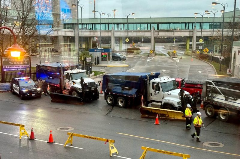 Vehicles block the Rainbow Bridge border crossing into the US in Niagara Falls, Ontario, after a car exploded at a US-Canada checkpoint on November 22, 2023. US terrorism investigators deployed Wednesday after a car erupted into a fireball at a US-Canada checkpoint, triggering border closures on one of the busiest travel days in the American holiday calendar. Two people were killed in the blast, according to US media citing authorities, although their identities were not yet public. (Photo by Usman KHAN / AFP) (Photo by USMAN KHAN/AFP via Getty Images)