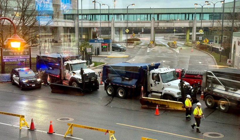 Vehicles block the Rainbow Bridge border crossing into the US in Niagara Falls, Ontario, after a car exploded at a US-Canada checkpoint on November 22, 2023. US terrorism investigators deployed Wednesday after a car erupted into a fireball at a US-Canada checkpoint, triggering border closures on one of the busiest travel days in the American holiday calendar. Two people were killed in the blast, according to US media citing authorities, although their identities were not yet public. (Photo by Usman KHAN / AFP) (Photo by USMAN KHAN/AFP via Getty Images)