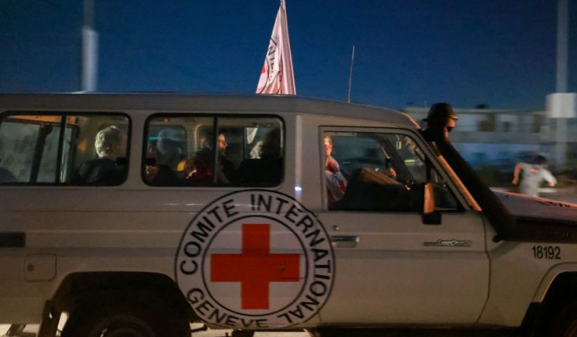 An International Red Cross vehicle reportedly carrying hostages released by Hamas crosses the Rafah border point in the Gaza Strip towards Egypt from where they would be flown to Israel to be reunited with their families, on November 24, 2023. After 48 days of gunfire and bombardment that claimed thousands of lives, a four-day truce in the Israel-Hamas war began on November 24 with 50 hostages set to be released in exchange for 150 Palestinian prisoners. (Photo by MOHAMMED ABED / AFP) (Photo by MOHAMMED ABED/AFP via Getty Images)