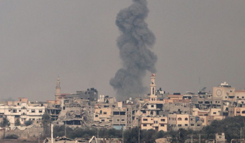 A picture taken in southern Israel near the border with the Gaza Strip on December 7, 2023, shows smoke billowing during Israeli bombardment on Gaza, amid continuing battles between Israel and the militant group Hamas. (Photo by Menahem KAHANA / AFP) (Photo by MENAHEM KAHANA/AFP via Getty Images)