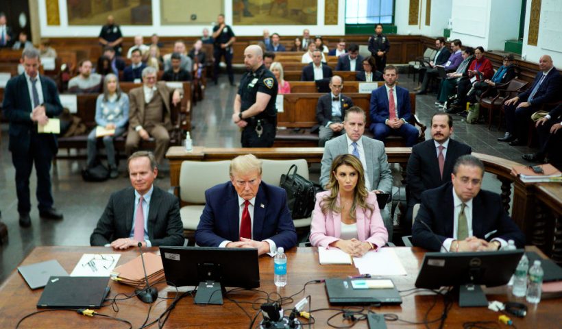 NEW YORK, NEW YORK - DECEMBER 7: Former U.S. President Donald Trump sits at the defense table with his attorneys Christopher Kise (L) and Alina Habba (2nd-R) in New York State Supreme Court on December 7, 2023 in New York City. Trump's civil fraud trial alleges that he and his two sons Donald Trump Jr. and Eric Trump conspired to inflate his net worth on financial statements provided to banks and insurers to secure loans. New York Attorney General Letitia James has sued seeking $250 million in damages. (Photo by Eduardo Munoz Alvarez-Pool/Getty Images)