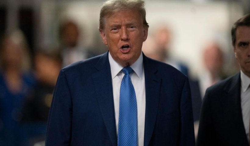 NEW YORK, NEW YORK - MAY 20: Former U.S. President Donald Trump speaks to the media after arriving for court during his trial for allegedly covering up hush money payments at Manhattan Criminal Court on May 20, 2024 in New York City. Former U.S. President Donald Trump faces 34 felony counts of falsifying business records in the first of his criminal cases to go to trial. (Photo by Steven Hirsch-Pool/Getty Images)