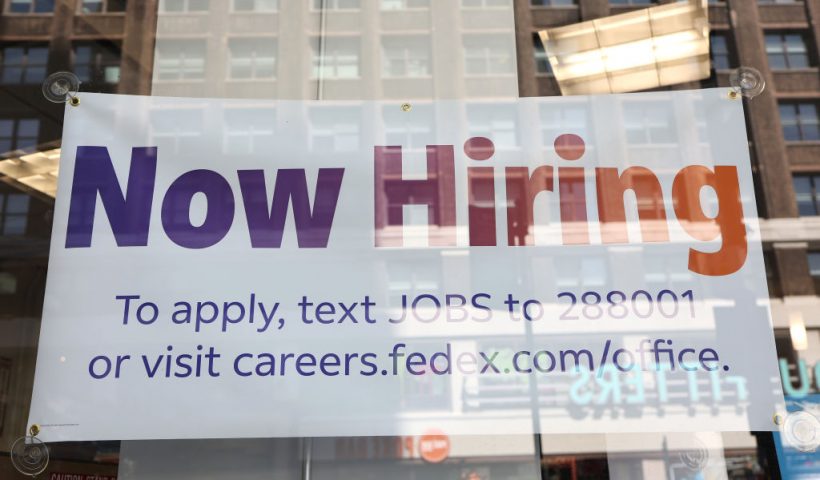 NEW YORK, NEW YORK - JUNE 07: A "Now Hiring" sign is seen at a FedEx location on Broadway on June 07, 2024 in New York City. A jobs report for the month of May released by Labor Department showed that the U.S. added employers added 272,000 nonagricultural jobs and also reported that the unemployment rate rose to 4 percent for the first time in more than two years. (Photo by Michael M. Santiago/Getty Images)