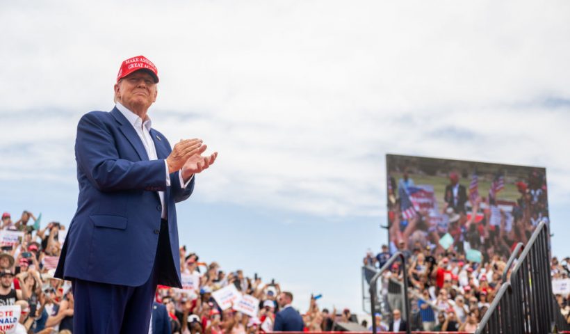 LAS VEGAS, NEVADA - JUNE 09: Republican presidential candidate, former U.S. President Donald Trump greets supporters upon arrival for his campaign rally at Sunset Park on June 09, 2024 in Las Vegas, Nevada. The former president continues campaigning around the country amidst ongoing legal troubles. Trump is scheduled to sit for a probation interview via video on June 10 related to the felony conviction in his New York hush money case. (Photo by Brandon Bell/Getty Images)