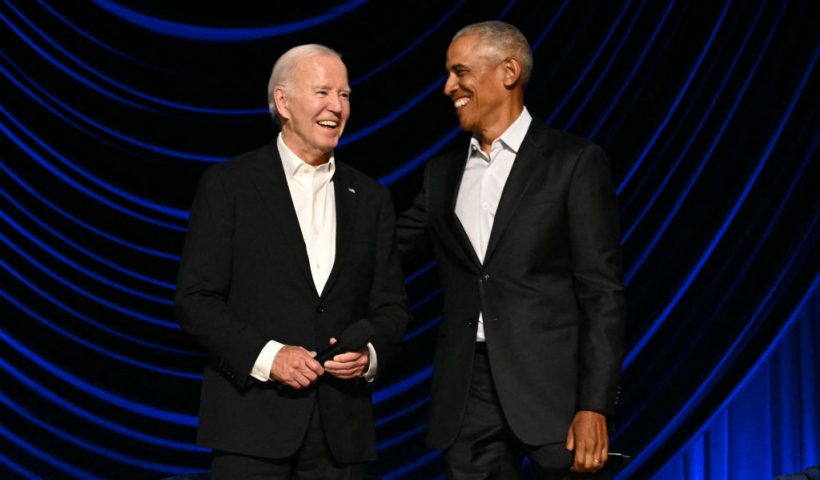 TOPSHOT - US President Joe Biden (L) stands with former US President Barack Obama onstage during a campaign fundraiser at the Peacock Theater in Los Angeles on June 15, 2024. (Photo by Mandel NGAN / AFP) (Photo by MANDEL NGAN/AFP via Getty Images)