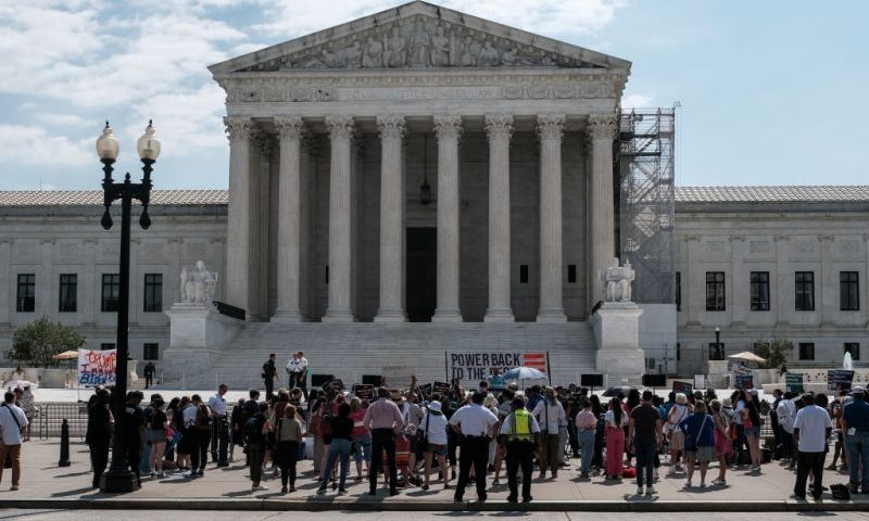 WASHINGTON, DC - JUNE 28: Demonstrators gather outside of the U.S. Supreme Court as opinions were issued on June 28, 2024 in Washington, D.C. The Supreme Court on Friday ruled in favor of a former police officer who is seeking to throw out an obstruction charge for joining the Capitol riot on Jan 6, 2021. (Photo by Michael A. McCoy/Getty Images)