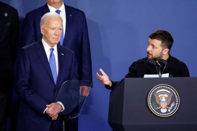 Ukraine's President Volodymyr Zelensky speaks alongside US President Joe Biden during a Ukraine Compact initiative on the sidelines of the NATO Summit at the Walter E. Washington Convention Center in Washington, DC, on July 11, 2024. (Photo by Ludovic MARIN / AFP) (Photo by LUDOVIC MARIN/AFP via Getty Images)