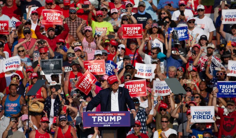 Former US President and Republican presidential candidate Donald Trump speaks during a campaign event at Butler Farm Show Inc. in Butler, Pennsylvania, July 13, 2024. Donald Trump was hit in the ear in an apparent assassination attempt by a gunman at a campaign rally on Saturday, in a chaotic and shocking incident that will fuel fears of instability ahead of the 2024 US presidential election. (Photo by Rebecca DROKE / AFP) (Photo by REBECCA DROKE/AFP via Getty Images)