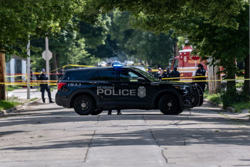 MILWAUKEE, WISCONSIN - JULY 16: Officers patrol the crime scene where a man was shot and killed by police near King Park on the west side of Milwaukee, Wisconsin. Security has been heightened around the RNC grounds since the attempted assassination of former President Donald Trump at his rally in Butler, Pennsylvania on July 13th. (Photo by Jim Vondruska/Getty Images)