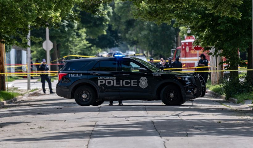 MILWAUKEE, WISCONSIN - JULY 16: Officers patrol the crime scene where a man was shot and killed by police near King Park on the west side of Milwaukee, Wisconsin. Security has been heightened around the RNC grounds since the attempted assassination of former President Donald Trump at his rally in Butler, Pennsylvania on July 13th. (Photo by Jim Vondruska/Getty Images)