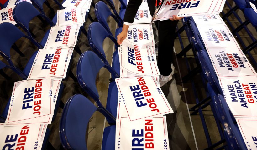 MILWAUKEE, WISCONSIN - JULY 18: Signs reading "Fire Joe Biden" are seen during preparations for the fourth day of the Republican National Convention at the Fiserv Forum on July 18, 2024 in Milwaukee, Wisconsin. Delegates, politicians, and the Republican faithful are in Milwaukee for the annual convention, concluding with former President Donald Trump accepting his party's presidential nomination. The RNC takes place from July 15-18. (Photo by Joe Raedle/Getty Images)