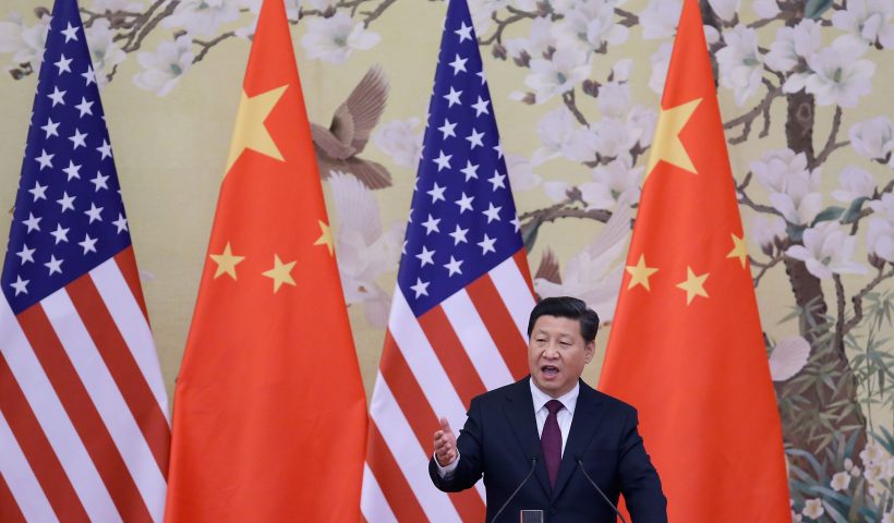 BEIJING, CHINA - NOVEMBER 12: Chinese President Xi Jinping (R) answers media's question during a press conference with U.S. President Barack Obama at the Great Hall of People on November 12, 2014 in Beijing, China. U.S. President Barack Obama pays a state visit to China after attending the 22nd Asia-Pacific Economic Cooperation (APEC) Economic Leaders' Meeting. (Photo by Feng Li/Getty Images)