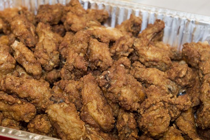 Chicken wings are seen before a chicken wing eating contest, on National Chicken Wing Day, at a Safeway grocery store in Washington, DC on July 29, 2015. Hickman won the contest and USD 500 after eating 26 chicken wings weighing 2.21 pounds in 5 minutes. AFP PHOTO/Paul J. Richards (Photo credit should read PAUL J. RICHARDS/AFP via Getty Images)