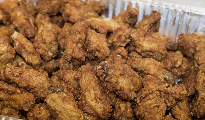 Chicken wings are seen before a chicken wing eating contest, on National Chicken Wing Day, at a Safeway grocery store in Washington, DC on July 29, 2015. Hickman won the contest and USD 500 after eating 26 chicken wings weighing 2.21 pounds in 5 minutes. AFP PHOTO/Paul J. Richards (Photo credit should read PAUL J. RICHARDS/AFP via Getty Images)