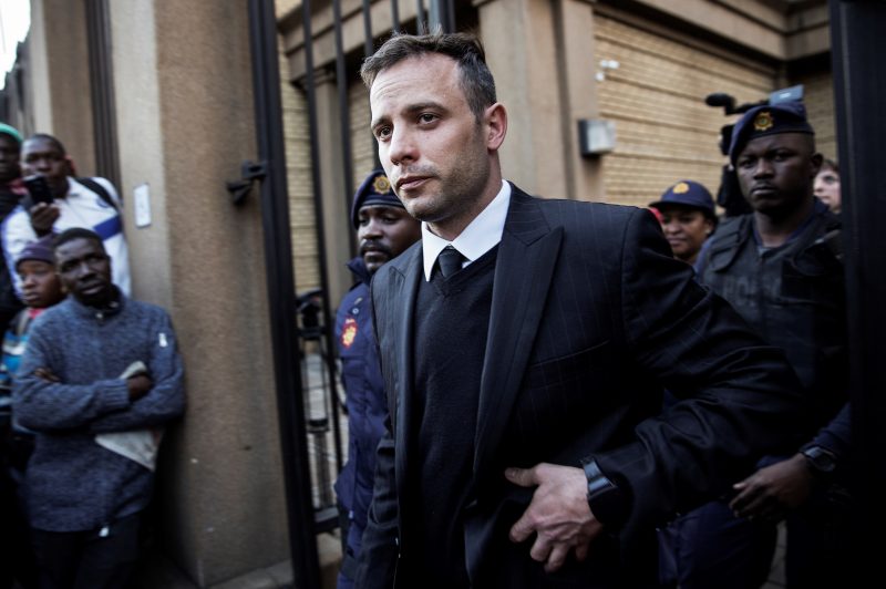 South African Paralympian Oscar Pistorius leaves the Pretoria High Court on June 15, 2016, after the third day of his resentencing hearing for the 2013 murder of his girlfriend Reeva Steenkamp.