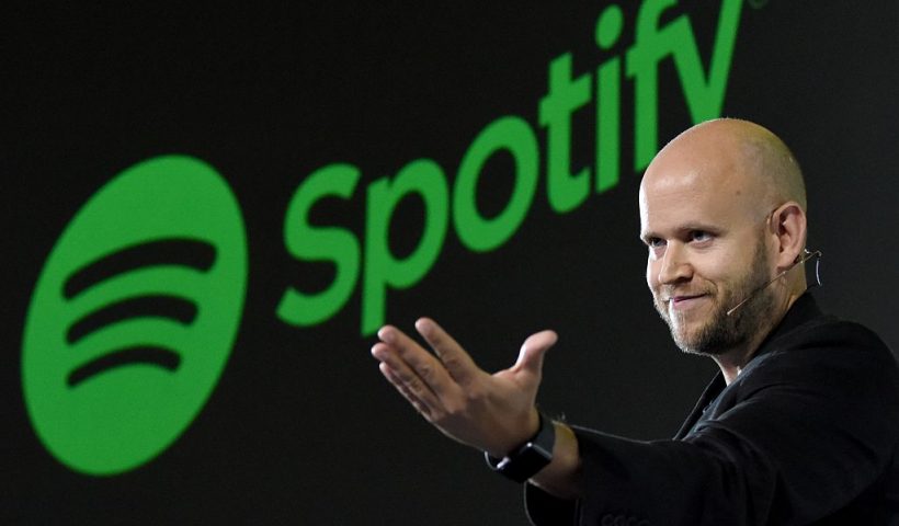 Daniel Ek, CEO of Swedish music streaming service Spotify, gestures as he makes a speech at a press conference in Tokyo on September 29, 2016.