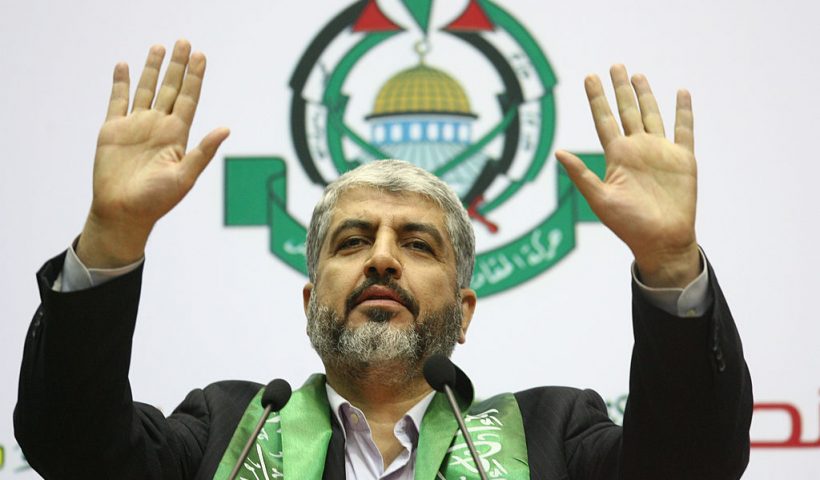 Exiled Hamas leader Khaled Meshaal addresses a rally in Damascus on January 22, 2010 to commemorate the first anniversary of the Islamic movement's "triumph" during Israel's devastating offensive in Gaza which ended just over a year ago. AFP PHOTO/LOUAI BESHARA (Photo credit should read LOUAI BESHARA/AFP via Getty Images)