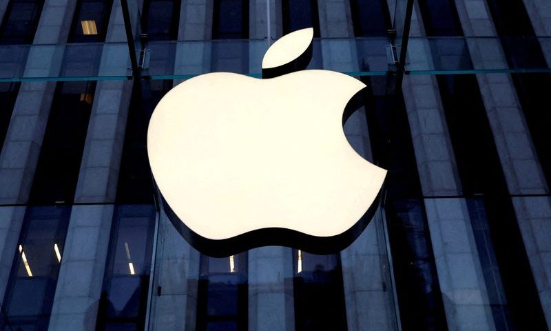 FILE PHOTO: The Apple Inc. logo is seen hanging at the entrance to the Apple store on 5th Avenue in Manhattan, New York, U.S., October 16, 2019. REUTERS/Mike Segar/