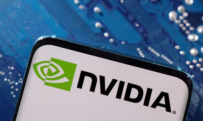 FILE PHOTO: A smartphone with a displayed NVIDIA logo is placed on a computer motherboard in this illustration taken March 6, 2023. REUTERS/Dado Ruvic/Illustration/File Photo