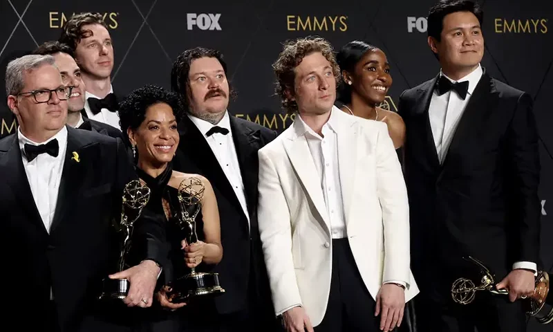 Jeremy Allen White, Ayo Edebiri, and cast members of "The Bear" pose together with awards, at the 75th Primetime Emmy Awards in Los Angeles, California, U.S., January 15, 2024. REUTERS/Aude Guerrucci/File Photo