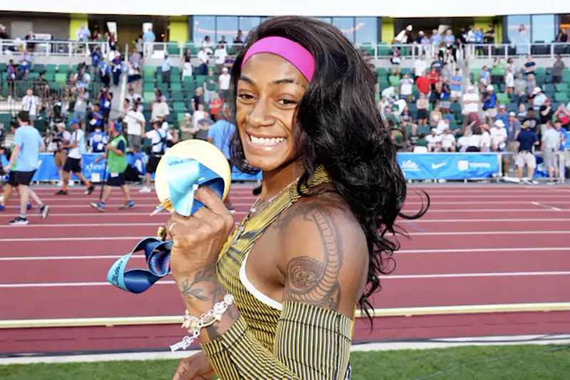 Sha'Carri Richardson poses with gold medal after winning the women's 100m in 10.70 during the US Olympic Team Trials at Hayward Field. Mandatory Credit: Kirby Lee-USA TODAY Sports