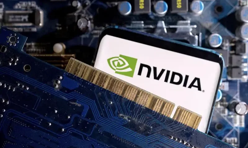 A smartphone with a displayed NVIDIA logo is placed on a computer motherboard in this illustration taken March 6, 2023. REUTERS/Dado Ruvic/Illustration/File Photo