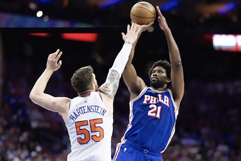 Philadelphia 76ers center Joel Embiid (21) shoots the ball against New York Knicks center Isaiah Hartenstein (55) during the second half of game six of the first round for the 2024 NBA playoffs at Wells Fargo Center. Mandatory Credit: Bill Streicher-USA TODAY Sports/File Photo