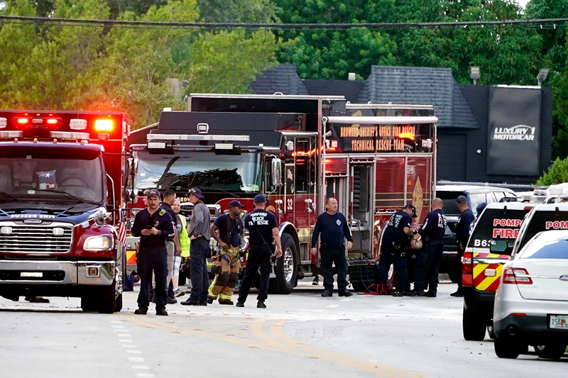 Helicopter Crash Florida
Fire and rescue personnel work in the area where a medical rescue helicopter crashed, Monday, Aug. 28, 2023, in Pompano Beach, Fla. (AP Photo/Marta Lavandier)