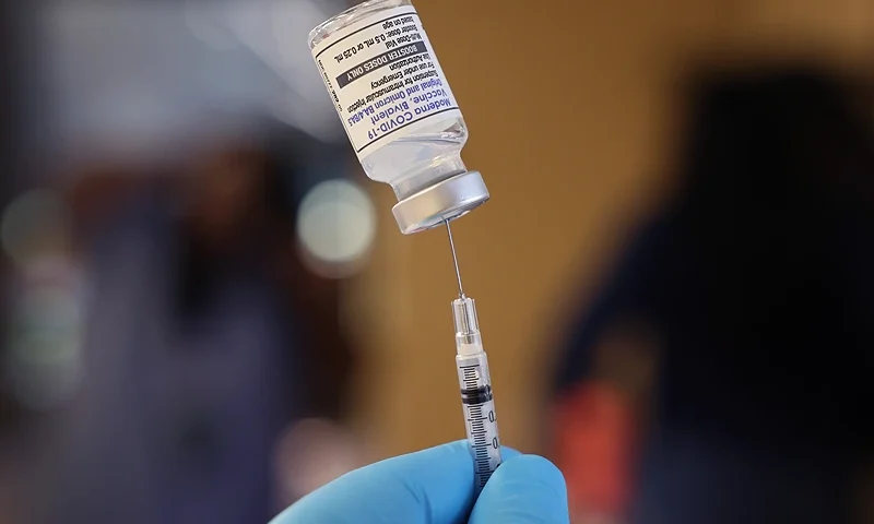 CHICAGO, ILLINOIS - SEPTEMBER 09: A pharmacist prepares to administer COVID-19 vaccine booster shots during an event hosted by the Chicago Department of Public Health at the Southwest Senior Center on September 09, 2022 in Chicago, Illinois. The recently authorized booster vaccine protects against the original SARS-CoV-2 virus and the more recent omicron variants, BA.4 and BA.5. (Photo by Scott Olson/Getty Images)