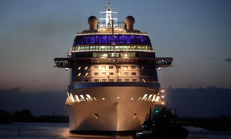 PAPENBURG, GERMANY - JUNE 20: Cruiser ship Celebrity Equinox leaves the Meyer Papenburg shipyard en-route to Eemshaven in the Netherlands on June 20, 2009 in Papenburg, Germany. The 317 metres long and 36,8 metres wide ship is one of five luxury cruise ships, which will be built for the American shipping company Celebrity Cruises until 2011. (Photo by Krafft Angerer/Getty Images)