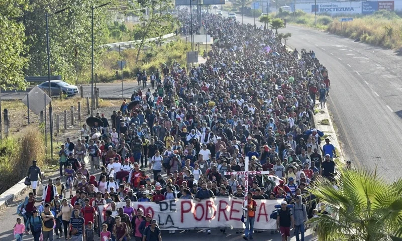 1 of 7 | Migrants depart from Tapachula, Mexico, Sunday, Dec. 24, 2023. The caravan started the trek north through Mexico just days before U.S. Secretary of State Antony Blinken arrives in Mexico City to discuss new agreements to control the surge of migrants seeking entry into the United States. (AP Photo/Edgar Hernandez Clemente)