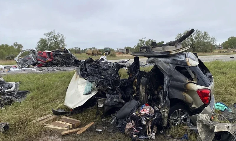 This image provided by the Texas Department of Public Safety, shows mangled vehicles at the scene of crash, Wednesday, Nov. 8, 2023, near Batesville, Texas. Eight people died in a South Texas car crash Wednesday while police chased a driver suspected of smuggling migrants, the Texas Department of Public Safety said. (Texas Department of Public Safety via AP)